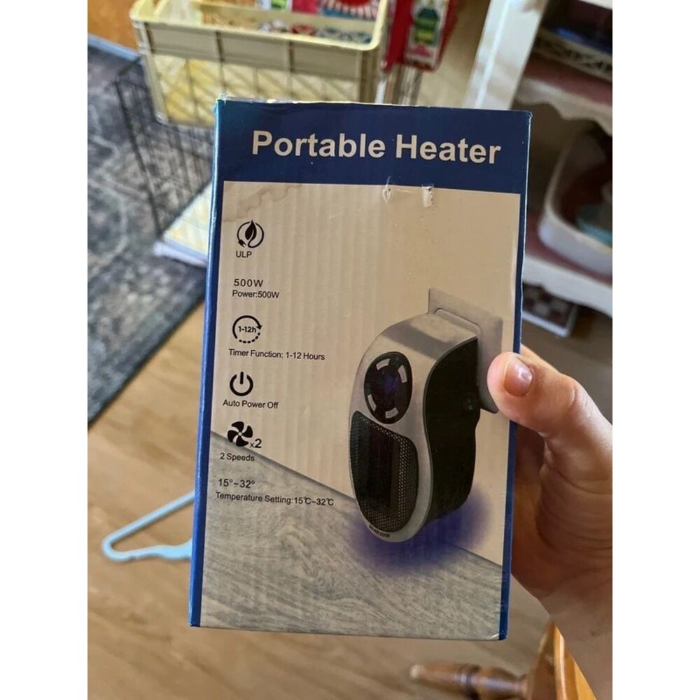 Portable plug in mini heater